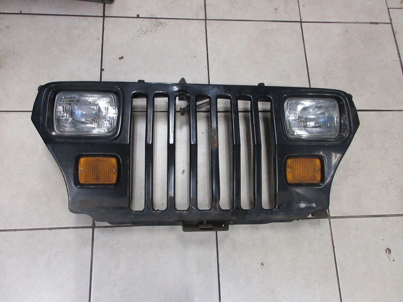 1987-1995 Jeep Wrangler YJ OEM Front Grille Grill Assembly 55345192 / 55026587